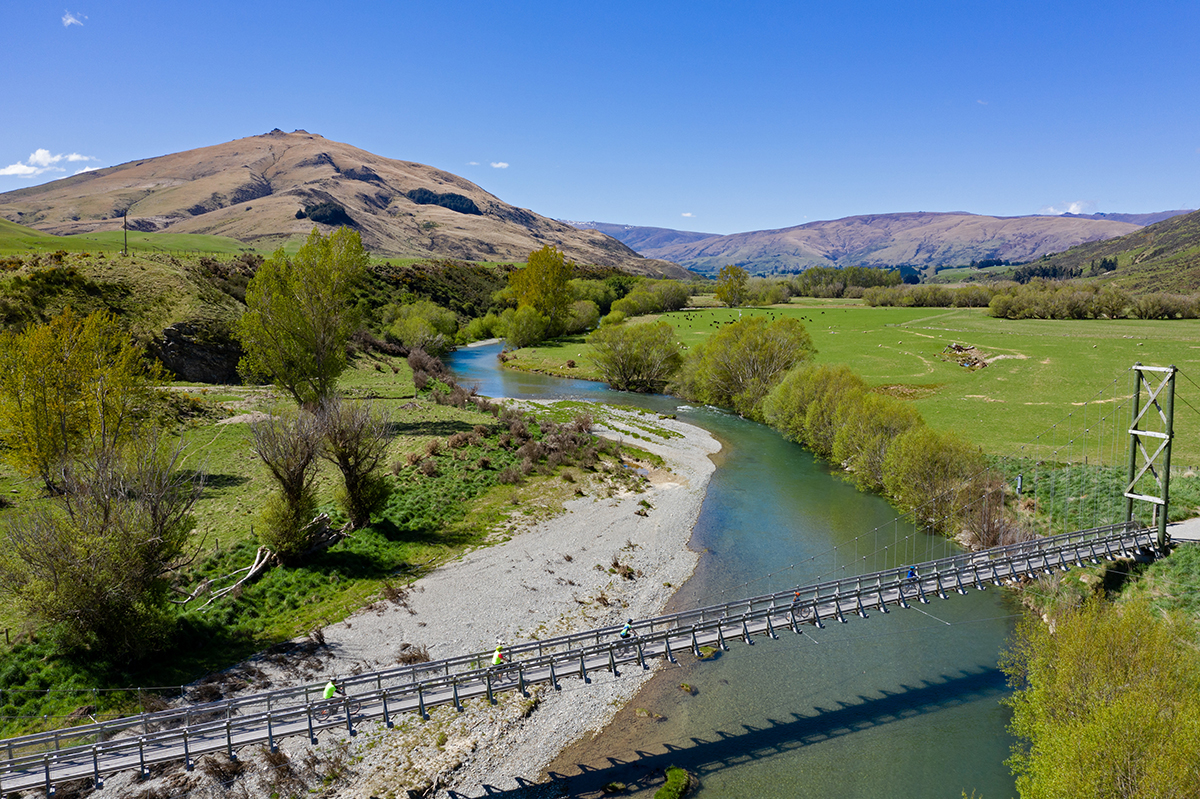 Day 3 image 1 Cycling across the Athol Bridge on the Around the Mountains Cycle Trail credit Chris McLennan WEB